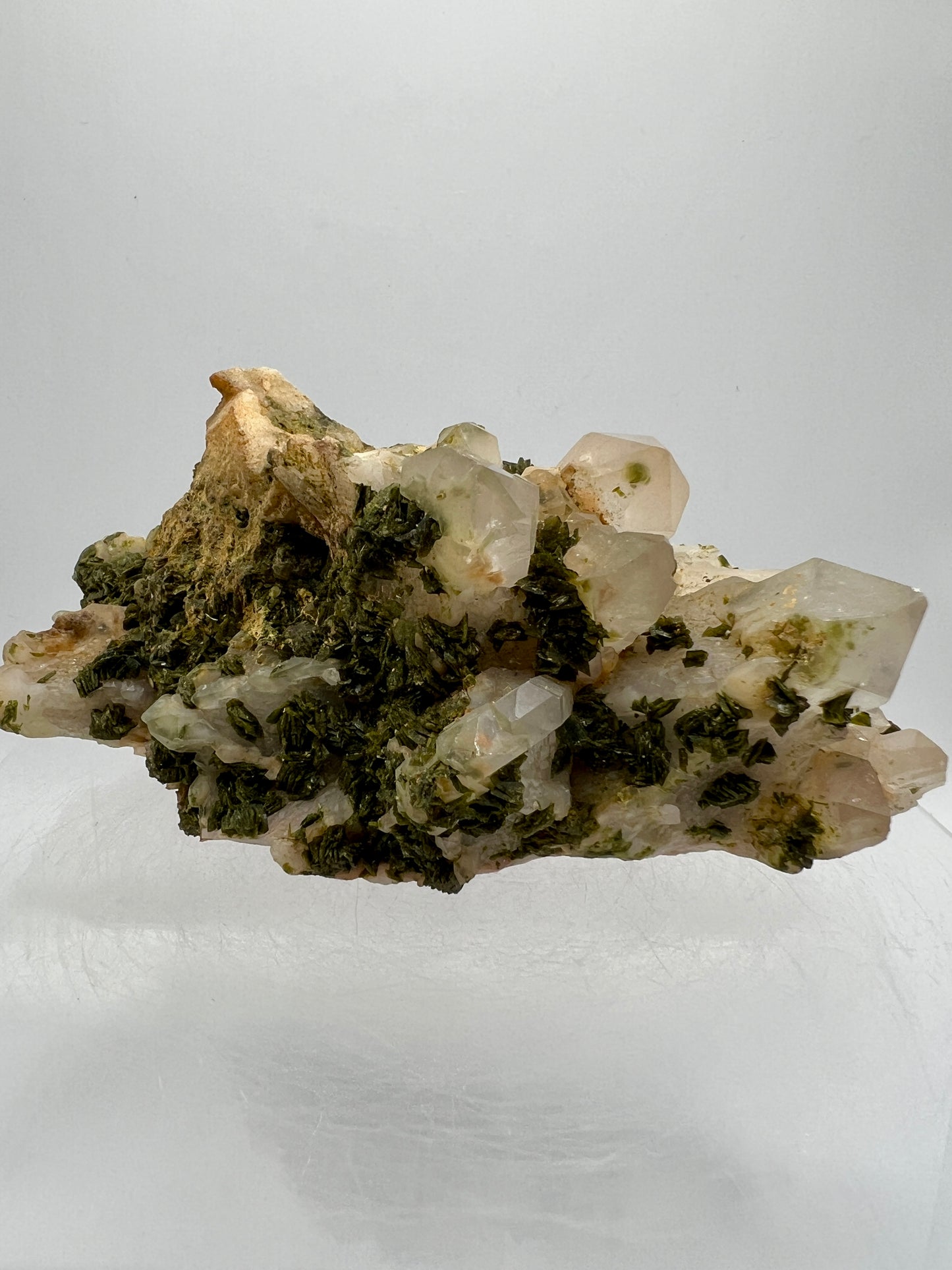 Epidote And Quartz Specimen. Stunning Quartz Cluster With Peach Inclusions Covered In Epidote.